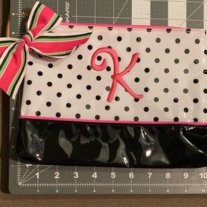 Mudpie Embroidered carry all pouch.